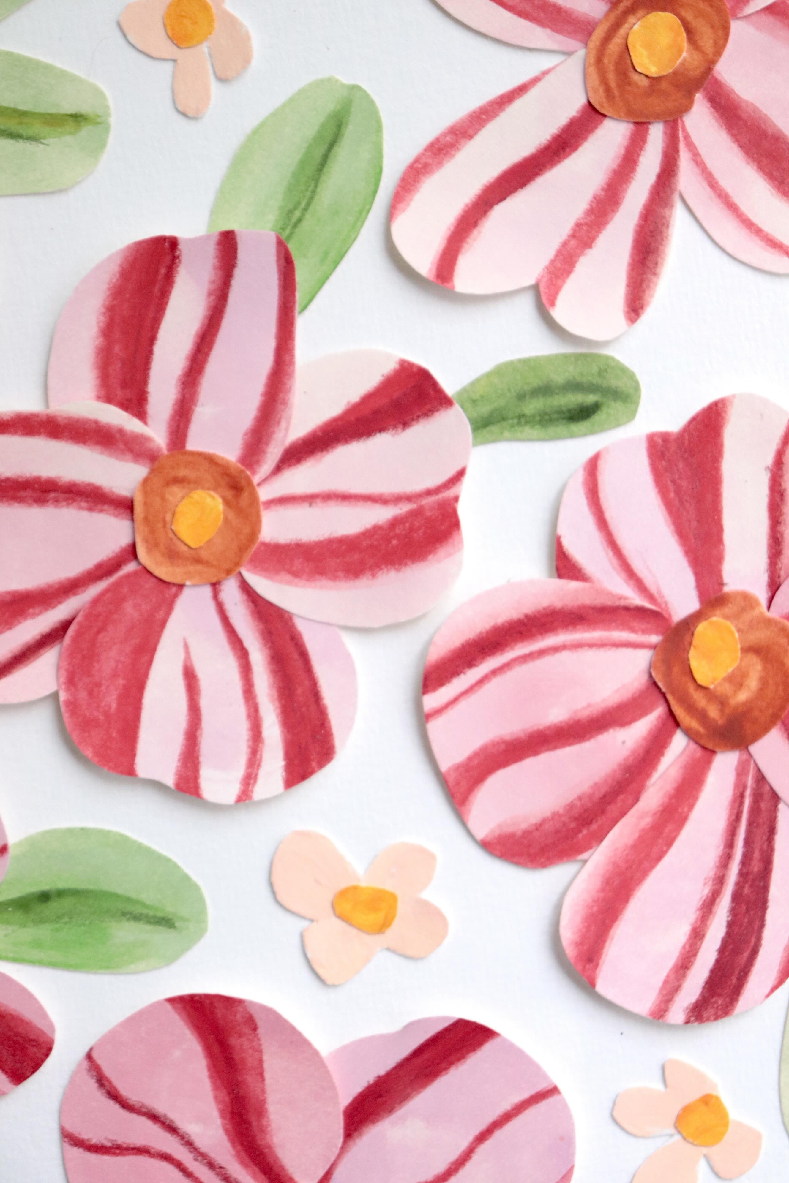  collage de fleurs en papier rose et rouge en relief sur fond blanc immaculé, création Chemin des Marettes.