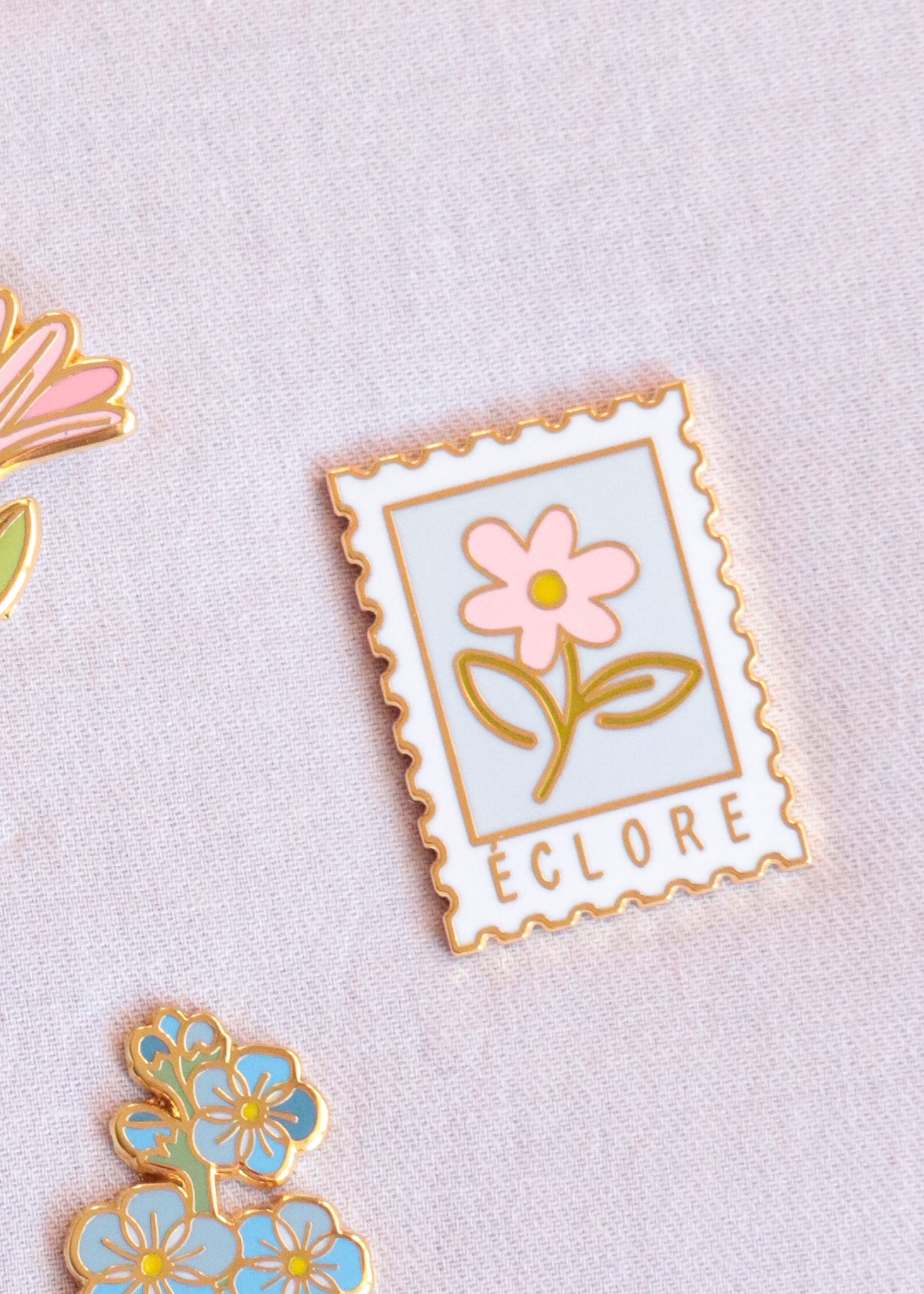 Pin's Timbre Éclore