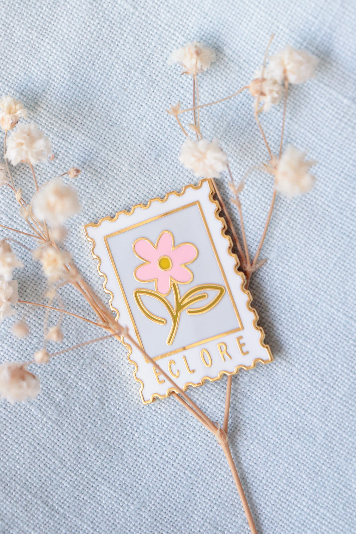 Pin's Timbre Éclore